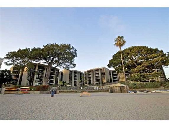 Front view of multi-story apartment buildings with balconies.