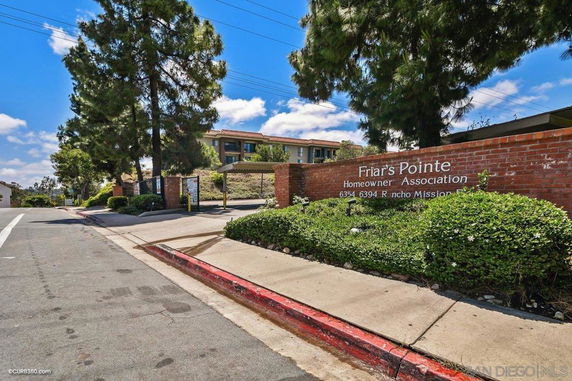 View of residential area with entrance to Friar's Pointe Homeowner Association.