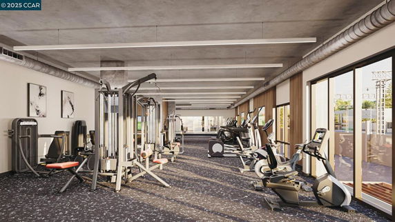 Gym area with various exercise equipment including treadmills and weight machines.