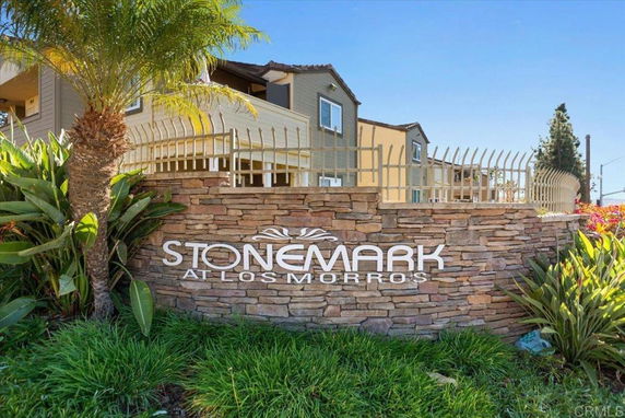 Front view of a multi-story building with a sign reading 'Stonemark at Los Morros'.