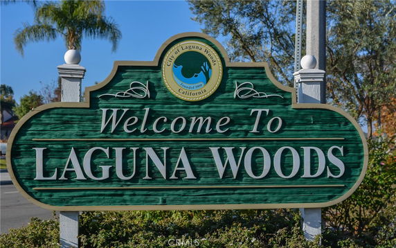 Signboard welcoming visitors to Laguna Woods.