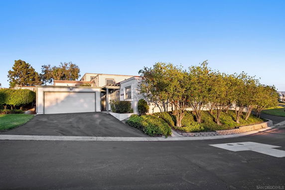 Front view of a house with a double garage.