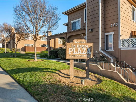 Front view of La Habra Plaza Condominiums building.