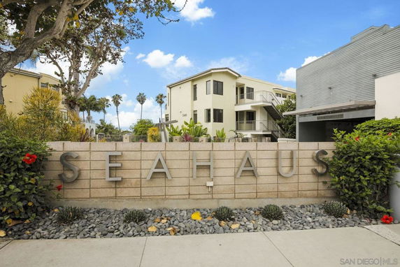 Front view of a modern multi-story building with prominent signage reading SEAHAUS.