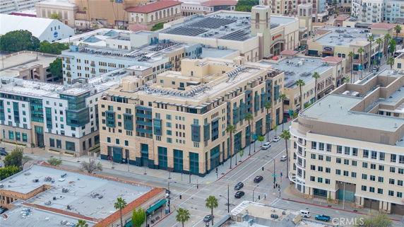 Aerial view of an urban area with multiple buildings and streets.