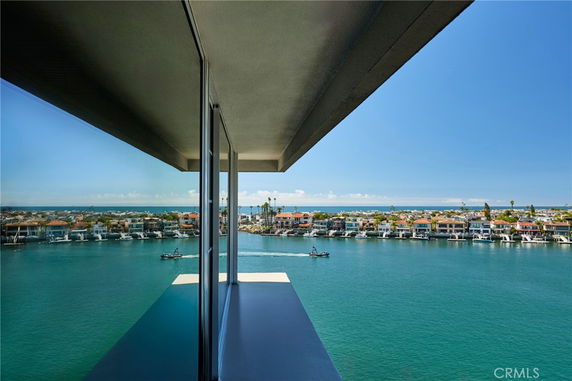 Panoramic view of waterfront and residential area from a building.
