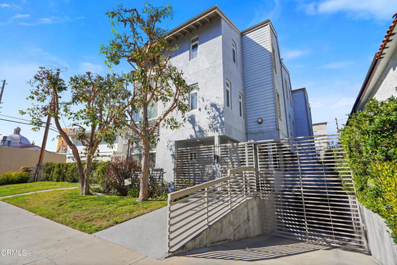 Front view of a multi-story building with a modern design.