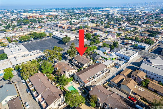 Aerial view of a residential area with multiple buildings and houses.
