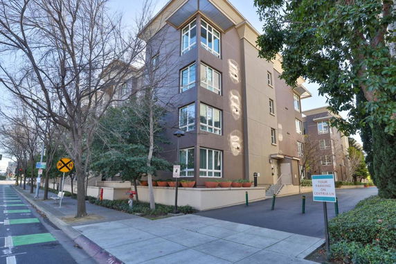 Front view of a multi-story residential building.