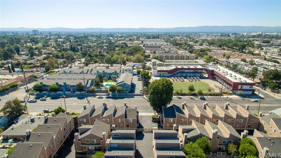 Wide angle view of residential neighborhood and surrounding areas.