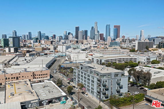 Panoramic view of a cityscape with skyscrapers and buildings.
