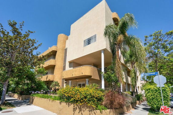 Front view of a multi-story apartment building.