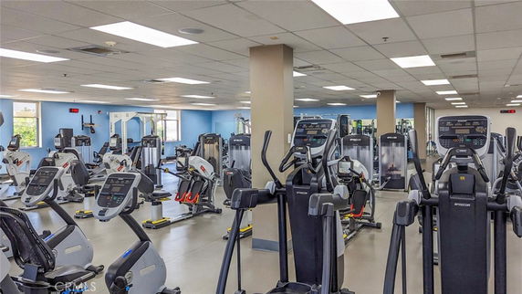 Interior view of a gym area with various exercise machines.