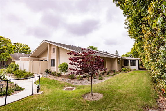 Front view of a single-story house with a sloped roof.