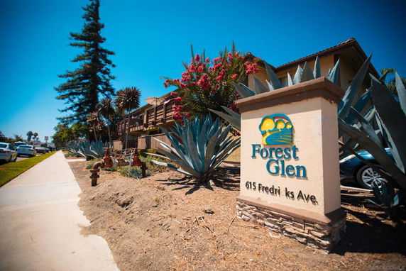 Front view of a building with a sign reading 'Forest Glen' at 615 Fredricks Ave.