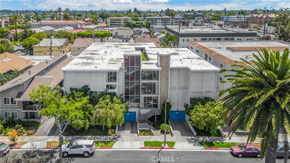 Front view of a multi-story building with a modern design.