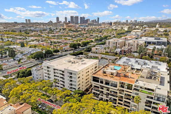 Panoramic view of a cityscape with buildings and urban skyline.