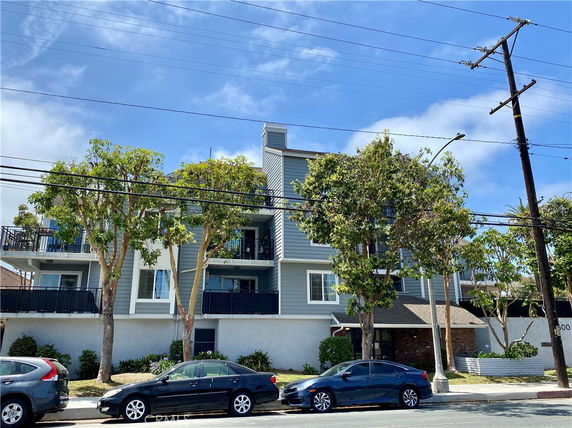 Front view of a multi-story residential building.