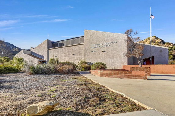 Front view of a community center with a modern architectural design.