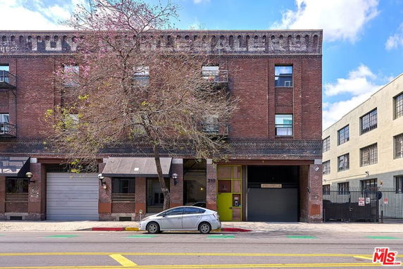 Front view of a multi-story brick building.