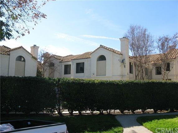 Front view of a multi-story residential building.