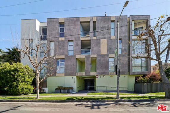 Front view of a multi-story building with a modern facade.