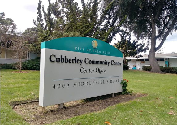 Front view of the Cubberley Community Center building with signage.
