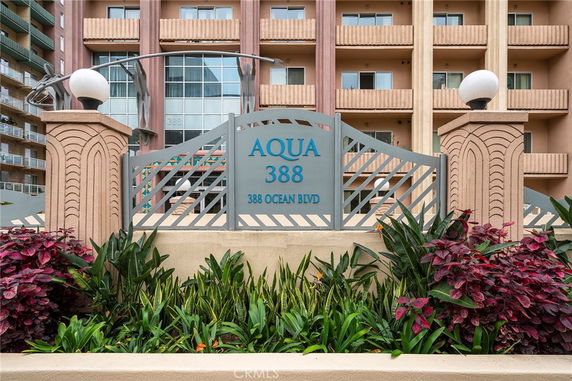 Front view of a multi-story building with prominent entrance signage.