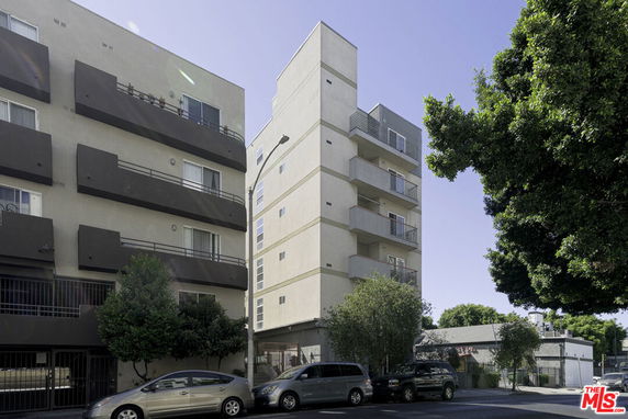 Front view of a multi-story residential building.