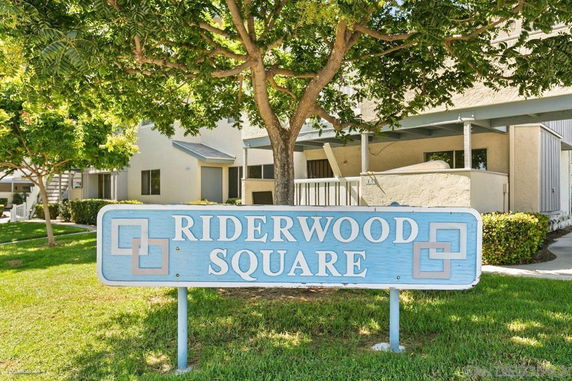Front view of a building with a sign that reads 'Riderwood Square'.