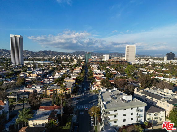 Panoramic view of an urban area with buildings and streets.