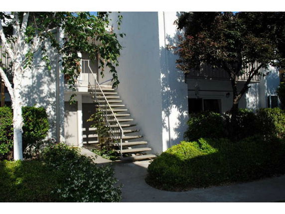 Front view of a building with an external staircase