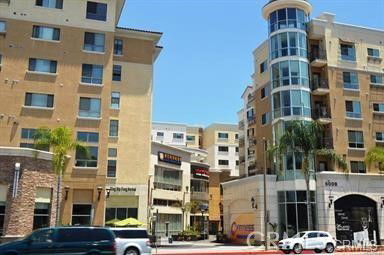 Front view of multiple multi-story buildings with modern architectural design.