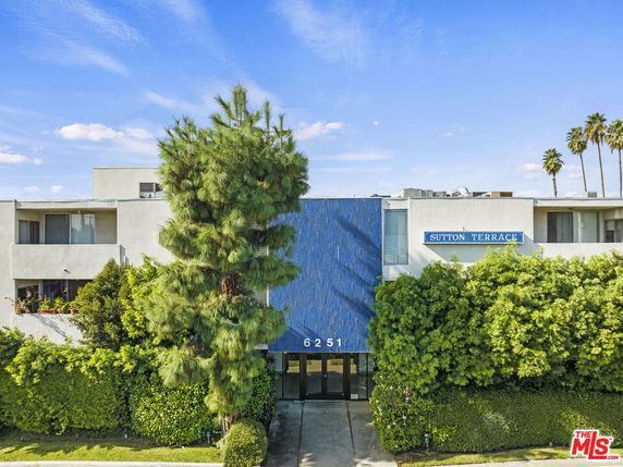 Front view of a multi-story building named Sutton Terrace