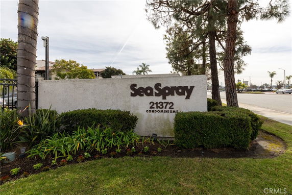 Entrance sign for Sea Spray Condominiums.