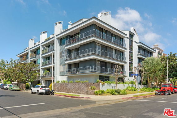 Front view of a multi-story apartment building.