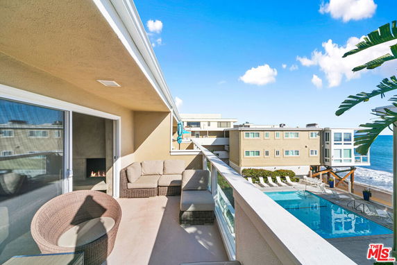 Panoramic view of buildings and ocean seen from the balcony