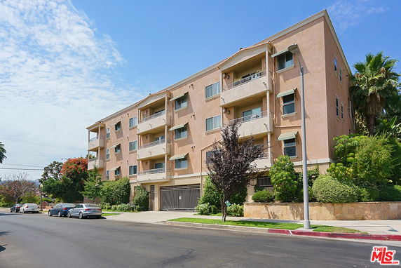 Front view of a four-story apartment building