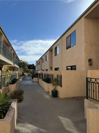 Front view of a two-story apartment building.