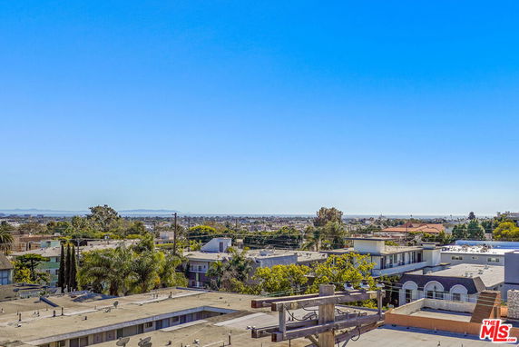 Wide angle view of urban area with multiple buildings.
