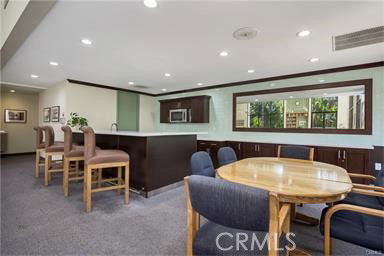 Recreational area with a countertop and seating in the clubhouse