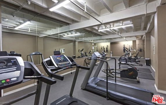 Indoor gym area with treadmills and exercise equipment.