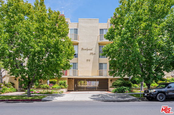 Front view of a multi-story residential building.
