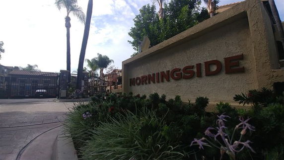 Front view of a building complex entrance with a sign reading 'MORNINGSIDE.'
