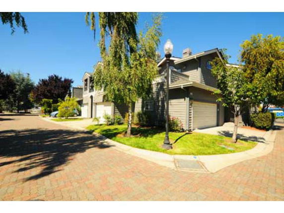 Front view of a two-story house with a double garage.
