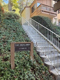 Front view of a building with stairs leading up to it