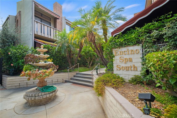 Front view of a building with a sign reading 'Encino Spa South'.