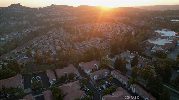 Aerial panoramic view of a residential area at sunset.
