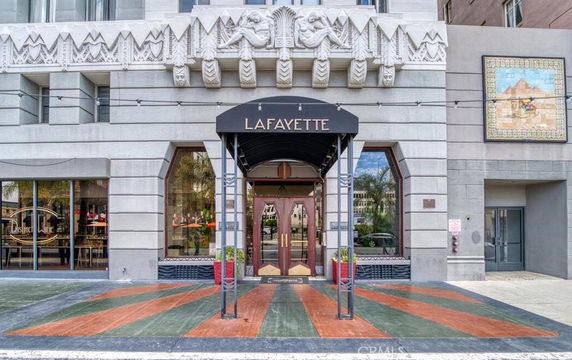 Front view of a building with an entrance canopy labeled Lafayette.