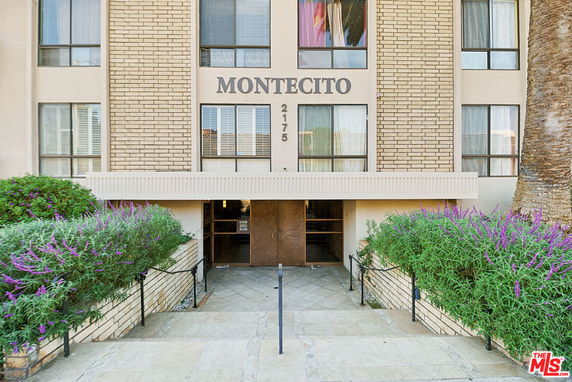 Front view of a building labeled 'Montecito' with multiple windows and entrance path.